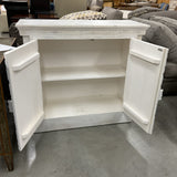 Coast to Coast Carved 2-Door Cabinet