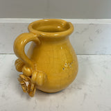 Yellow Pottery Pitcher