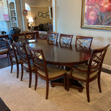 Universal Table with 1 Leaf and 10 Chairs