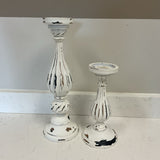 Pair of White Distdressed Candlesticks