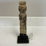 Squatting Statue